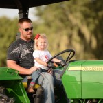 Stevie-with-Dad-on-the-Tractor